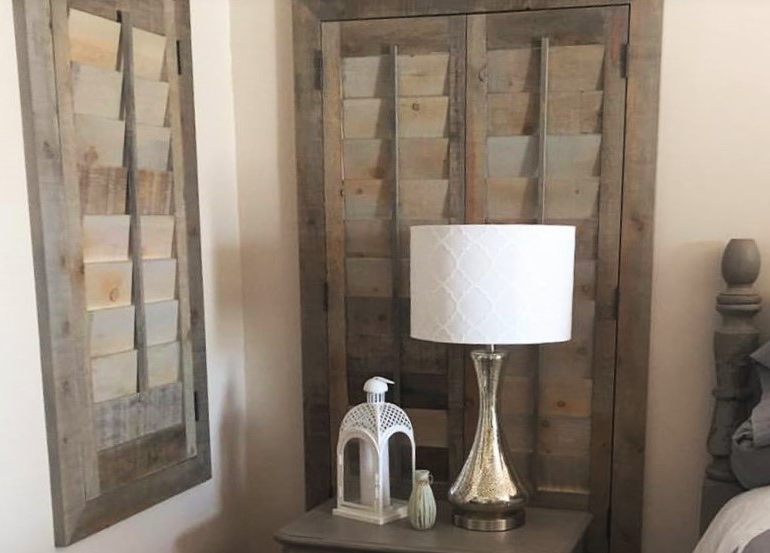 Fort Lauderdale bedroom with reclaimed wood shutters.